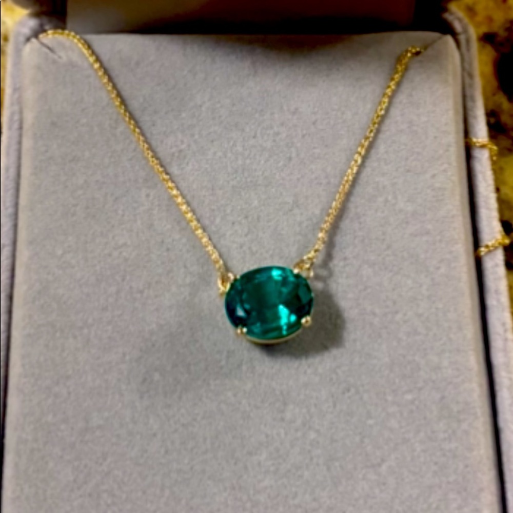 CUSTOM made natural emerald necklace. Set in gold with nice clasp at neck.